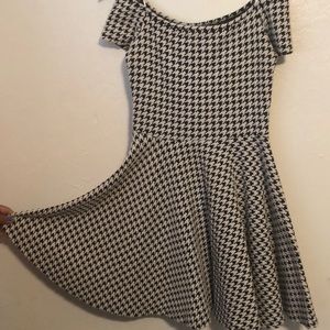 An off the shoulder dress.